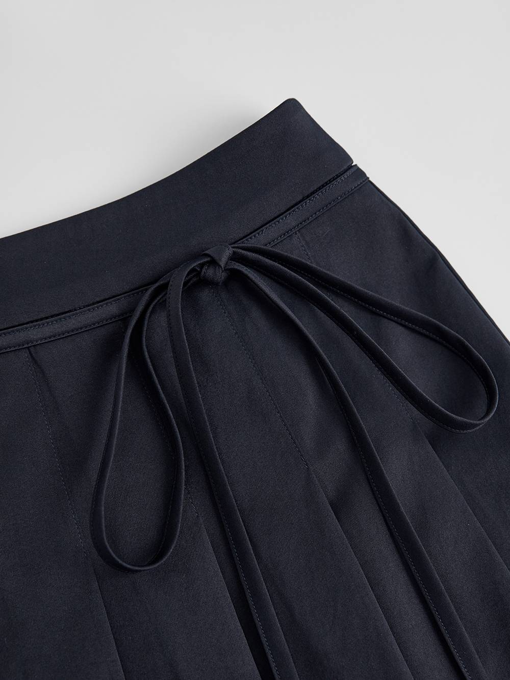 Belted Jacket and Pleated Skirt